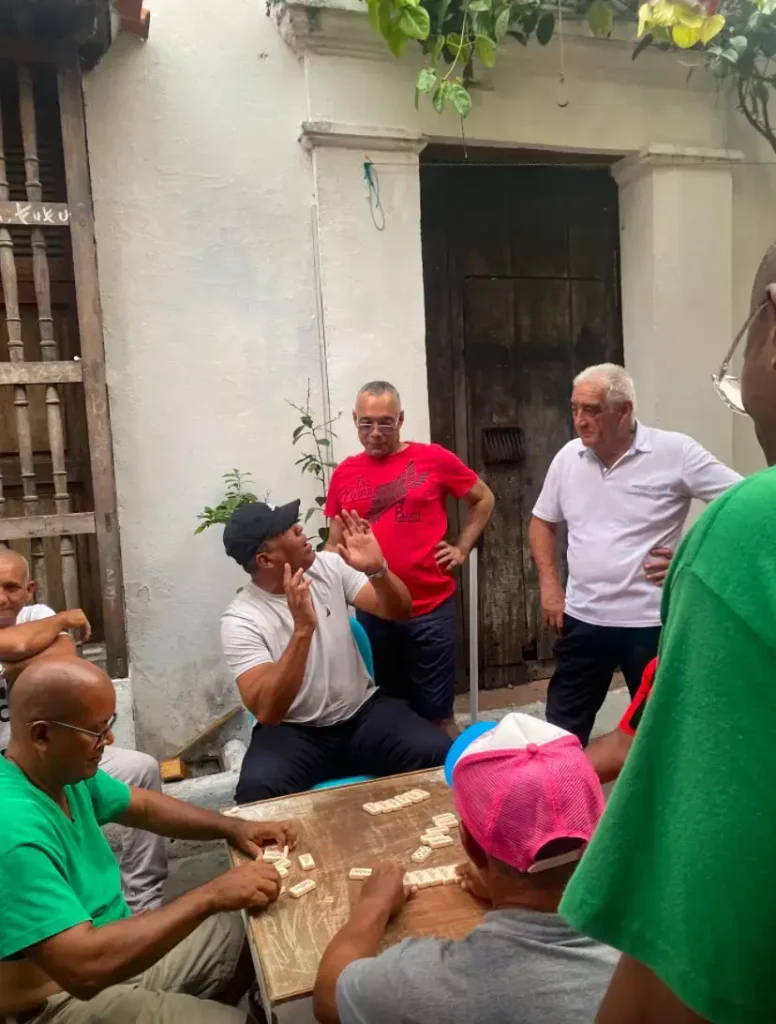  The same 5 men in real life, playing dominos on the streets of Getsemani. 